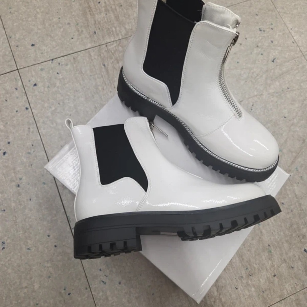 Sleek White Combat Boots with Black Accents